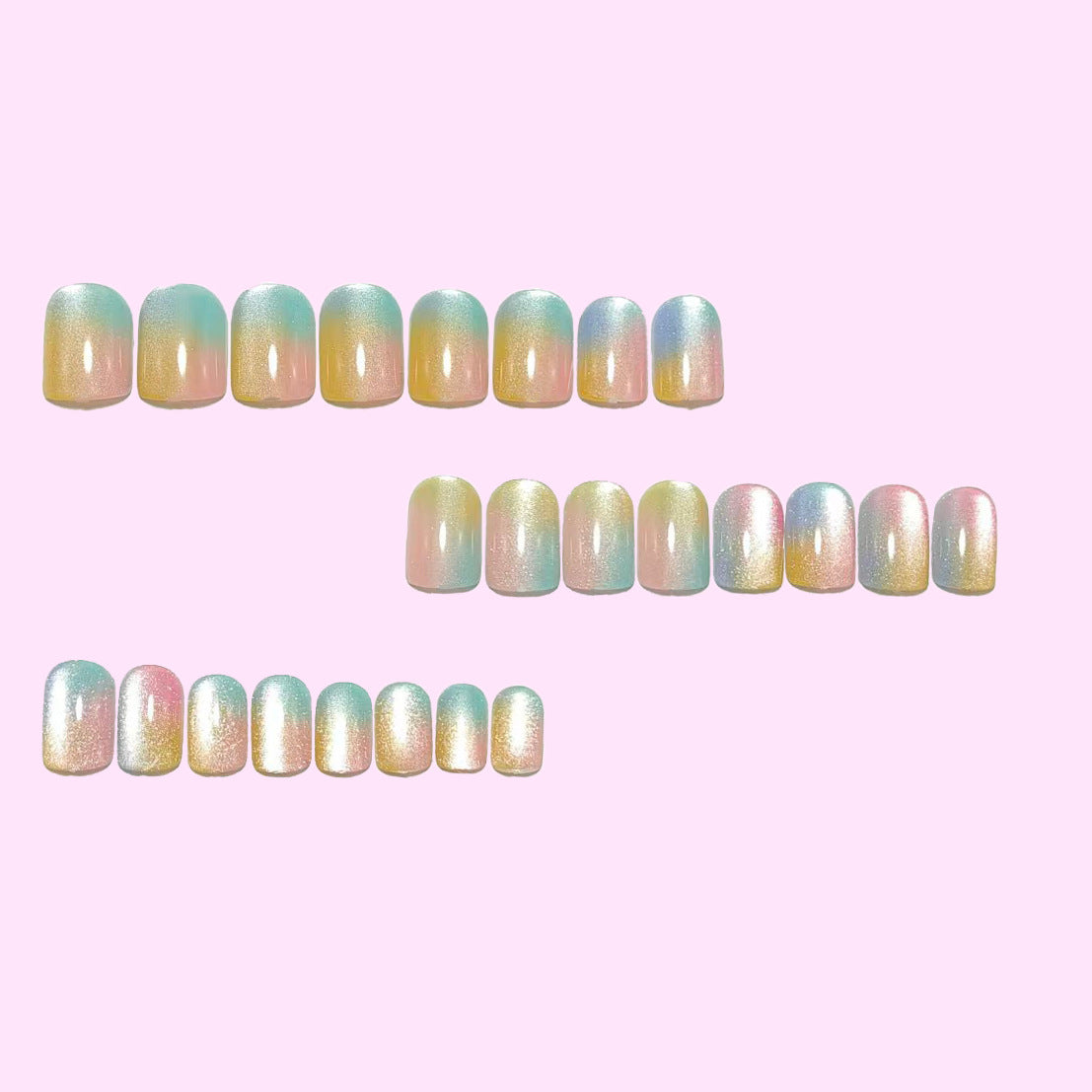 Artificial nails in delicate ombre design with glitter effects Acalora