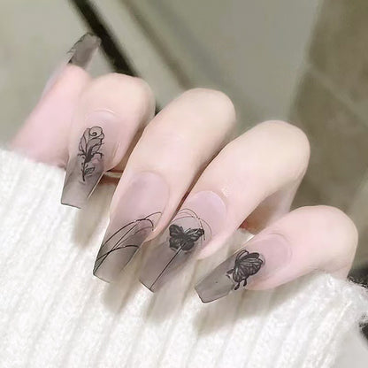 Artificial nail set with elegant flower design and delicate butterfly motifs Acalora