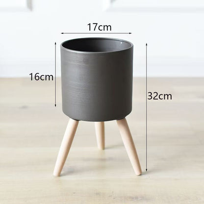 Plant pot with wooden stand