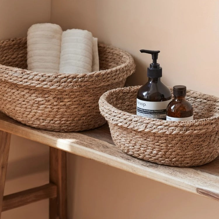 Handcrafted storage basket made of natural materials Acalora
