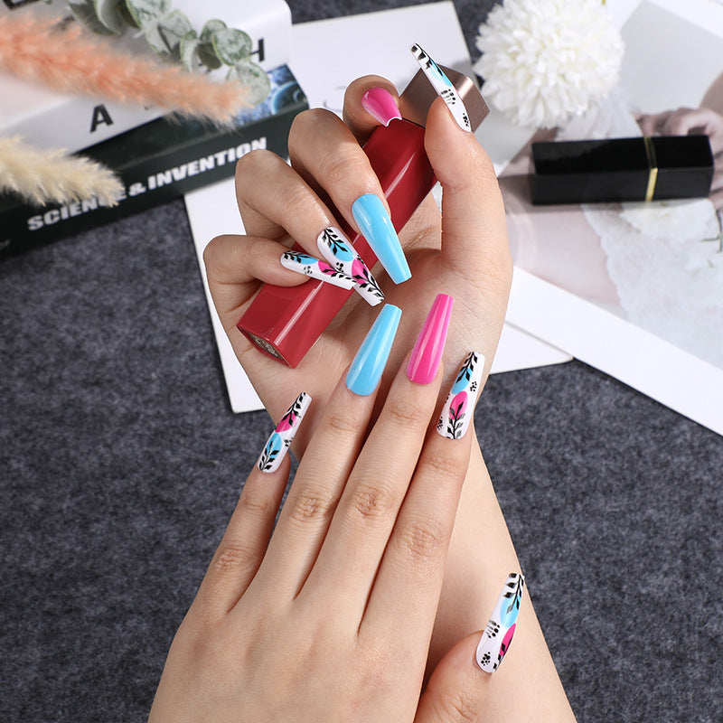 Artificial nails with floral design and creative accents Acalora