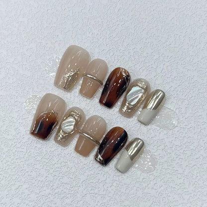 Elegant Nail Art Set with Unique Marble and Metallic Accents Acalora