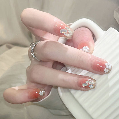 Artificial nail set with floral 3D decorations and elegant glitter Acalora