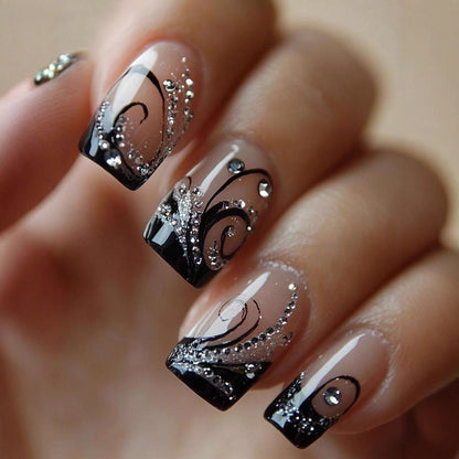 Artificial nails in elegant black-and-white design with glitter applications Acalora