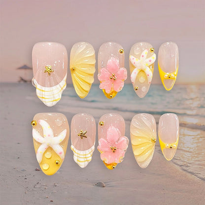 Artificial nail set with glamorous floral designs and creative glitter accents Acalora