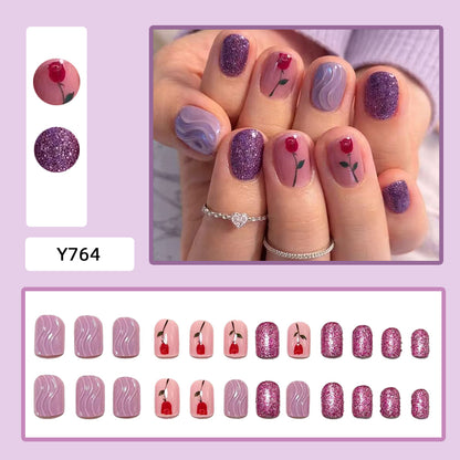 False nails with glamorous glitter design Acalora