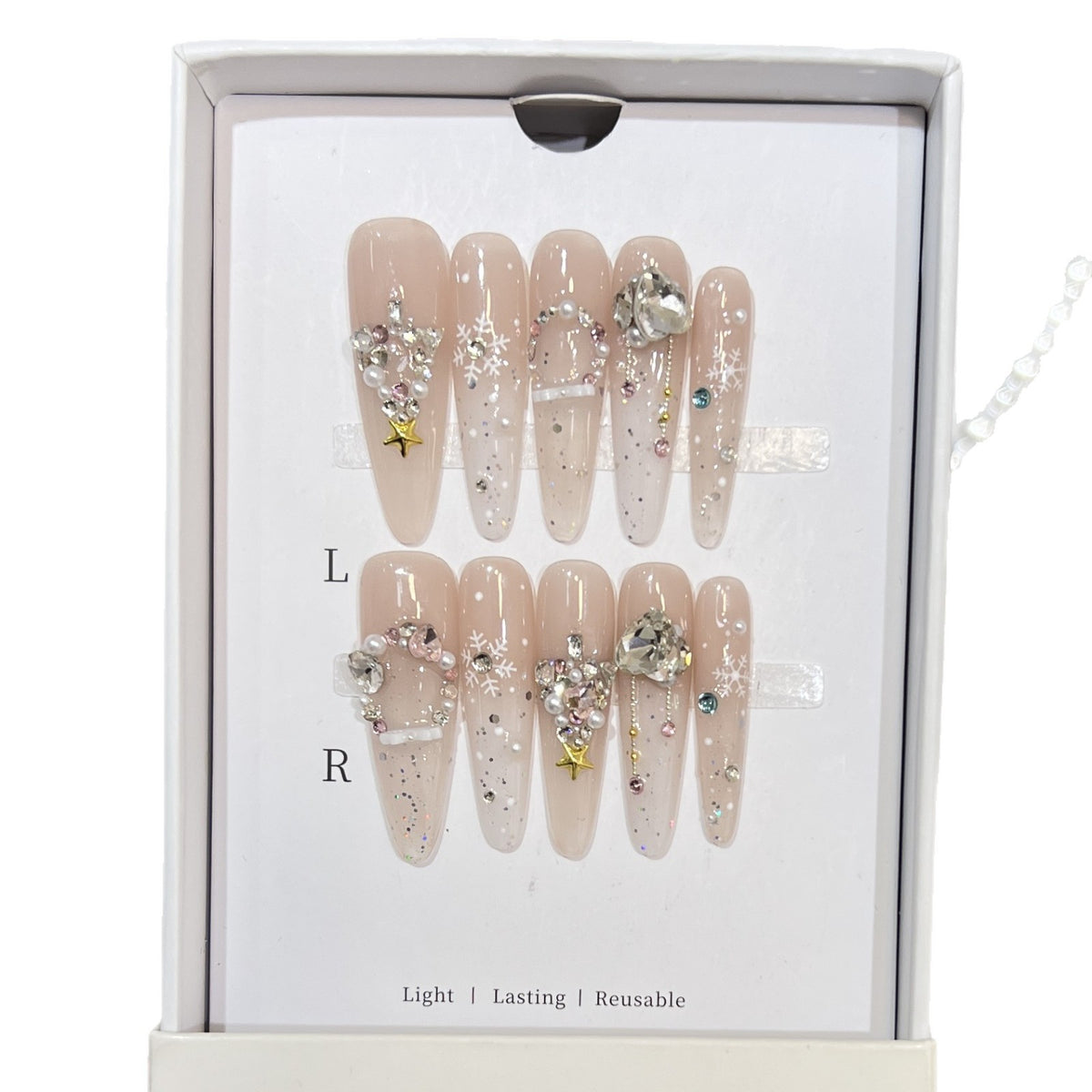 Artistic Press-On Nail Set with Snowflake and Gemstone Designs Acalora