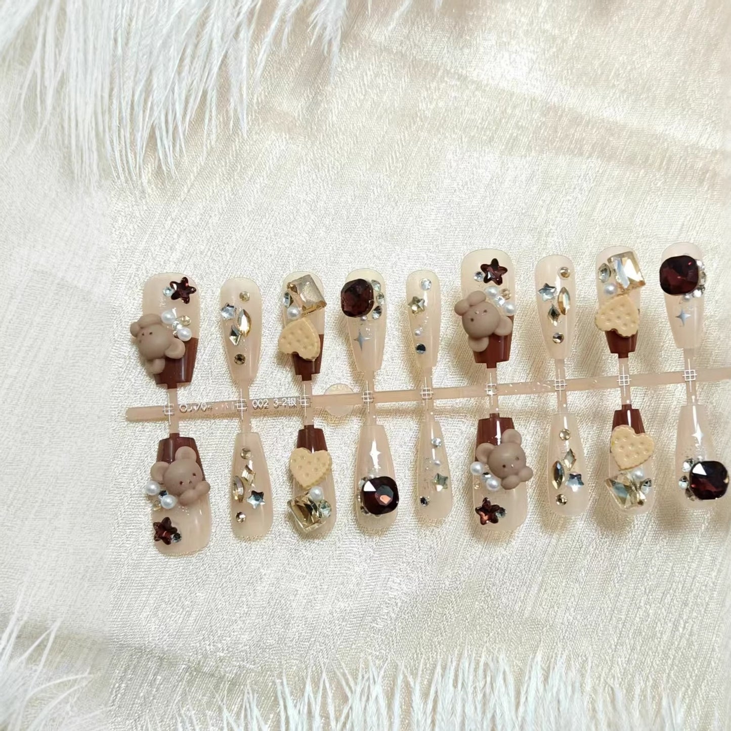 Artificial nails with charming animal and glitter design Acalora