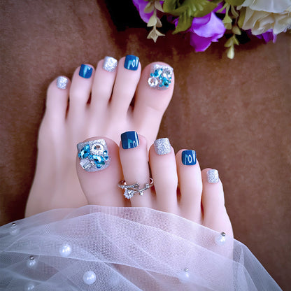 Artful toenail art with glitter and stone appliqués Acalora
