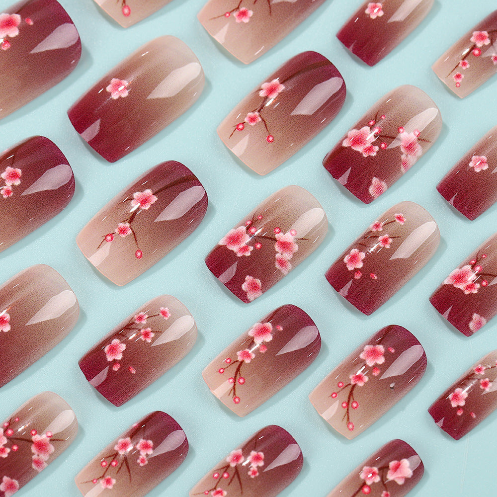 Artificial nails set with floral accents Acalora