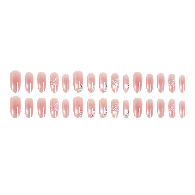 Acrylic nail set with elegant ombre design and sparkling accents Acalora