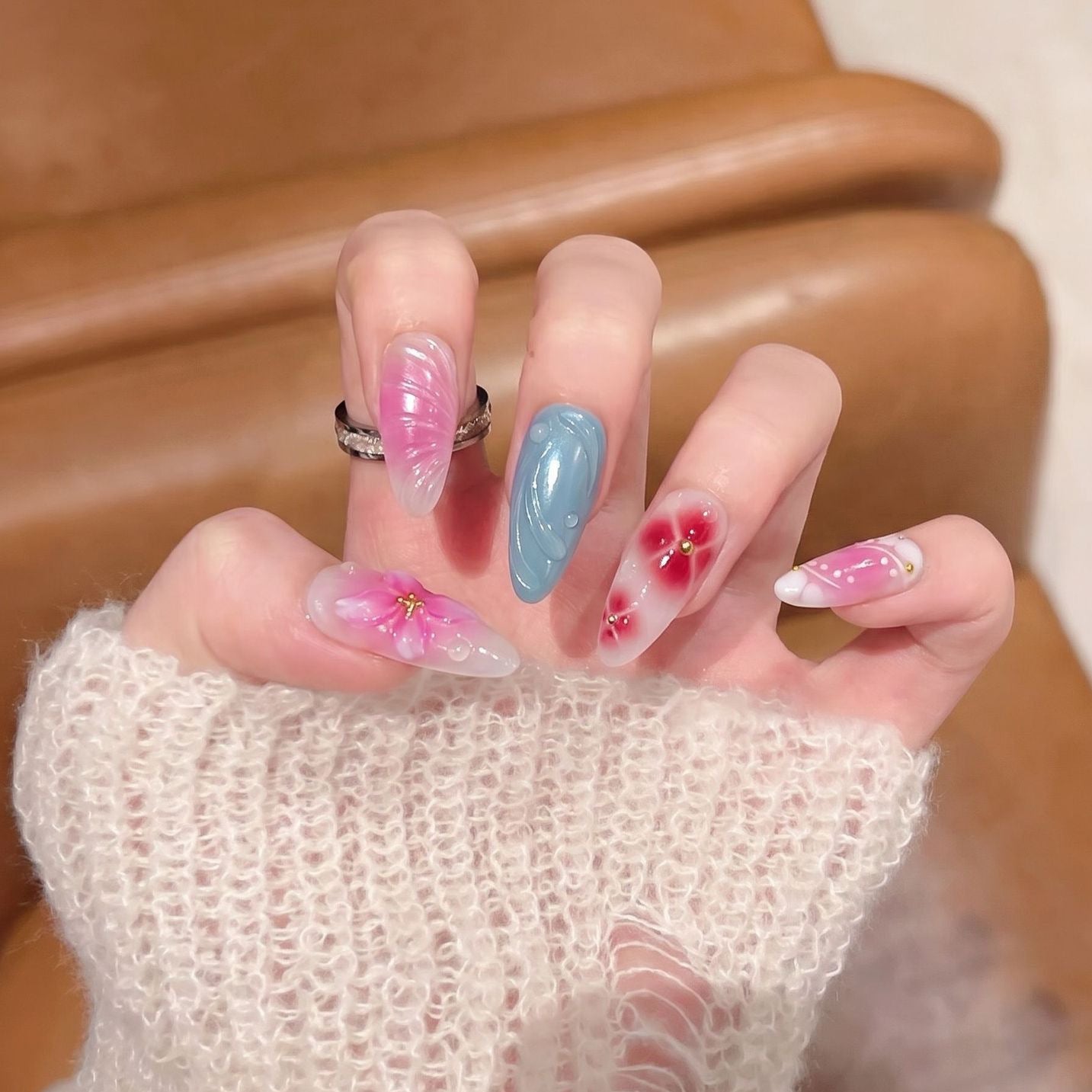 Artistic Press-On Nail Set with Floral and Abstract Designs Acalora