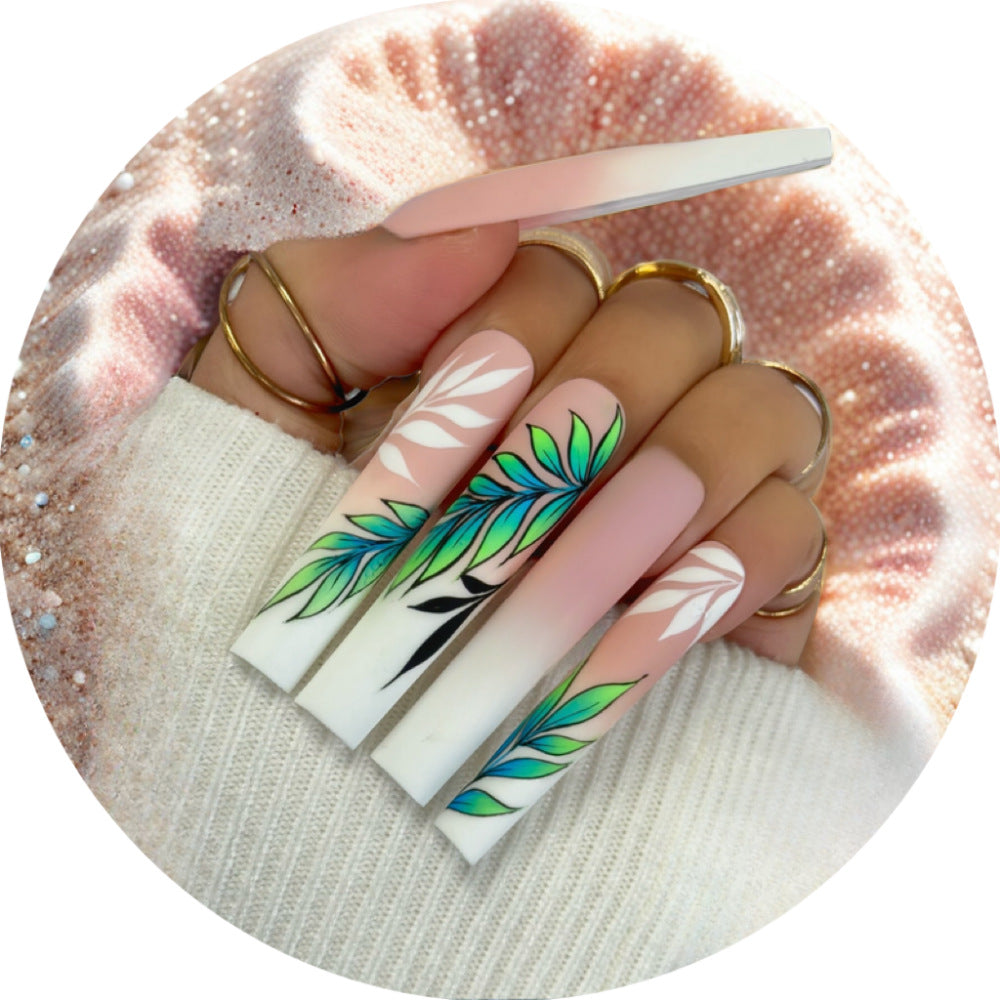 Artificial nails with elegant ombre design and floral accents Acalora