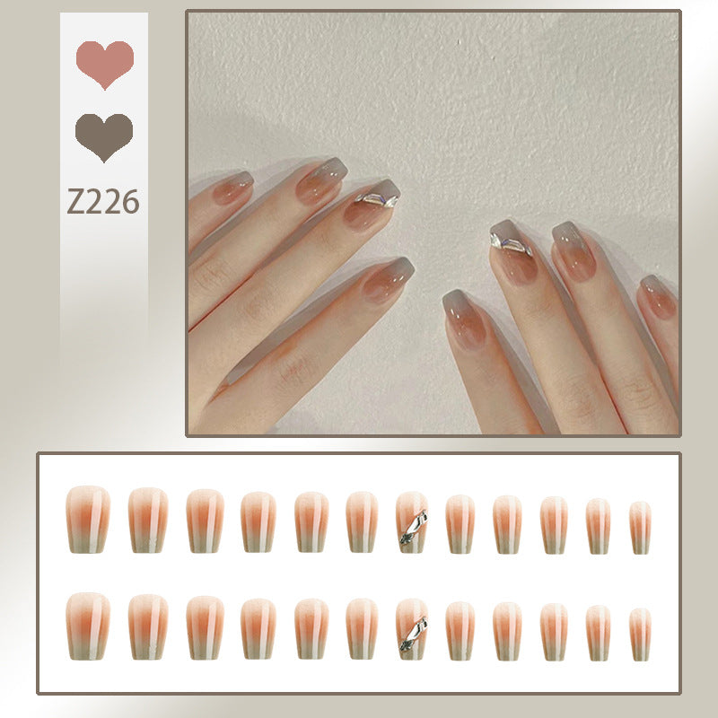 Artificial nail set with elegant ombre design and sparkling applications Acalora