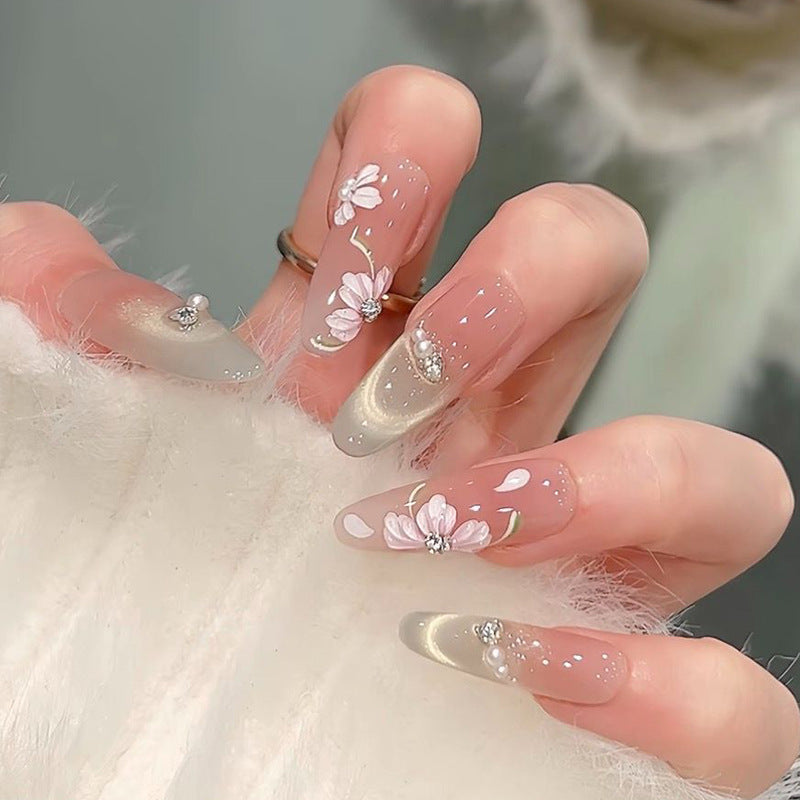 Glamorous artificial nail tips with 3D flower and crystal embellishments Acalora
