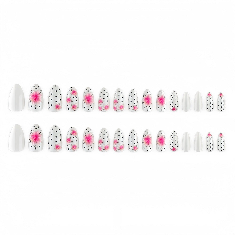 Artificial nail set with floral accents and polka dots Acalora