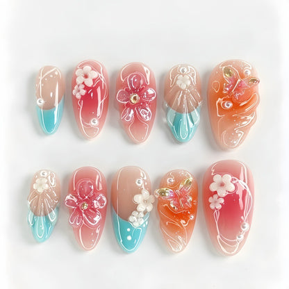 Artificial nail set with floral accents and glittering 3D applications Acalora