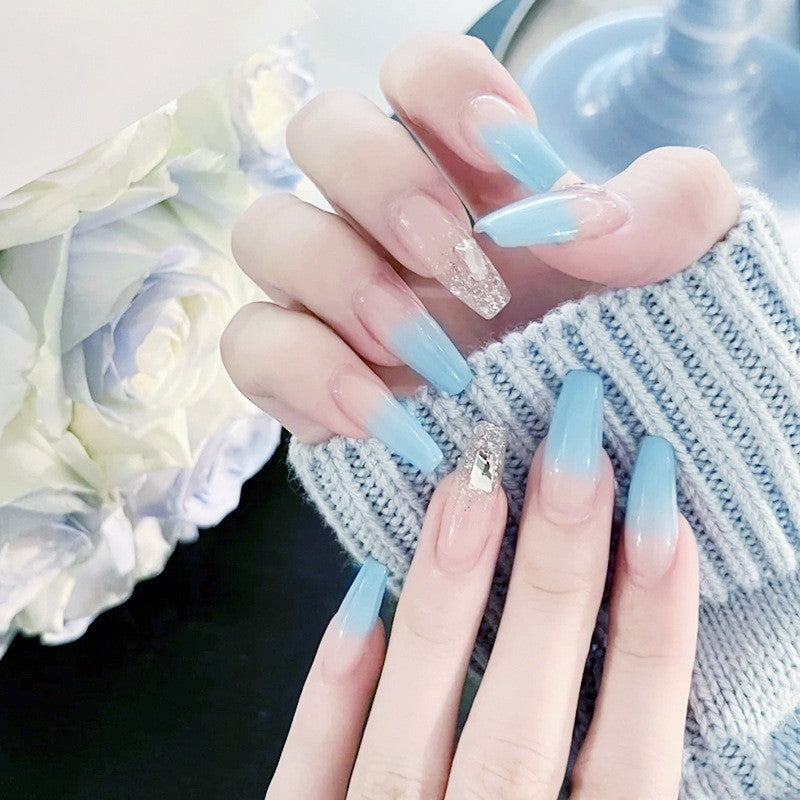Nail set with elegant ombre and glitter accents Acalora