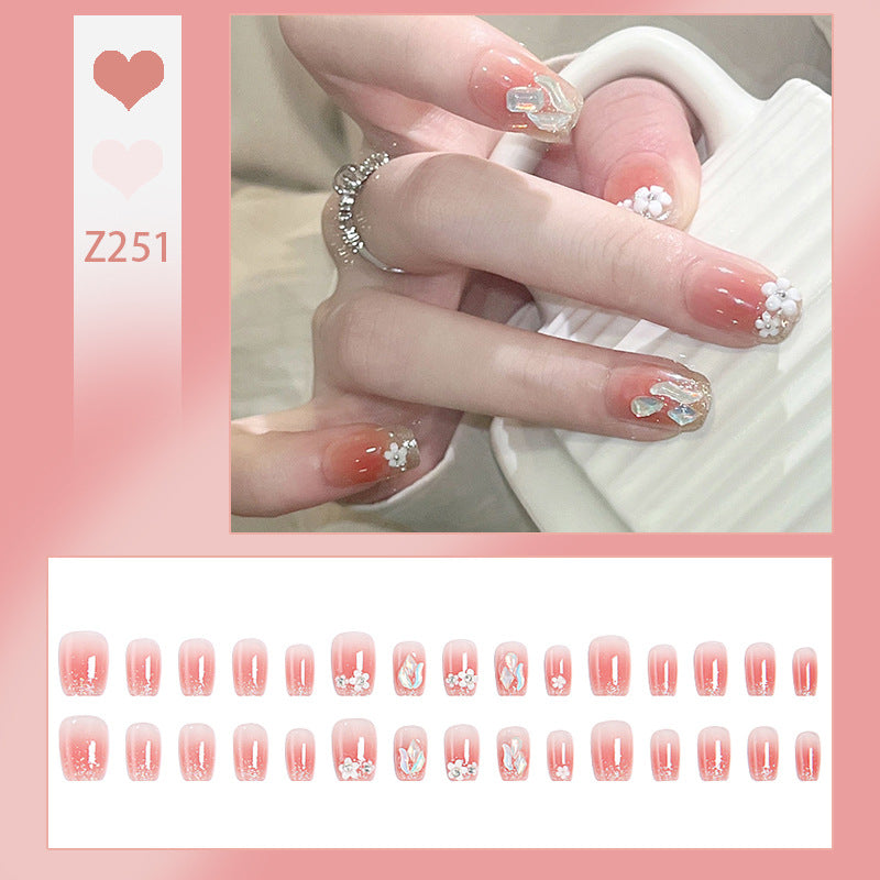 Artificial nail set with floral 3D decorations and elegant glitter Acalora