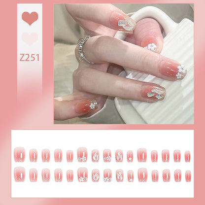 Artificial nail set with floral 3D decorations and elegant glitter Acalora