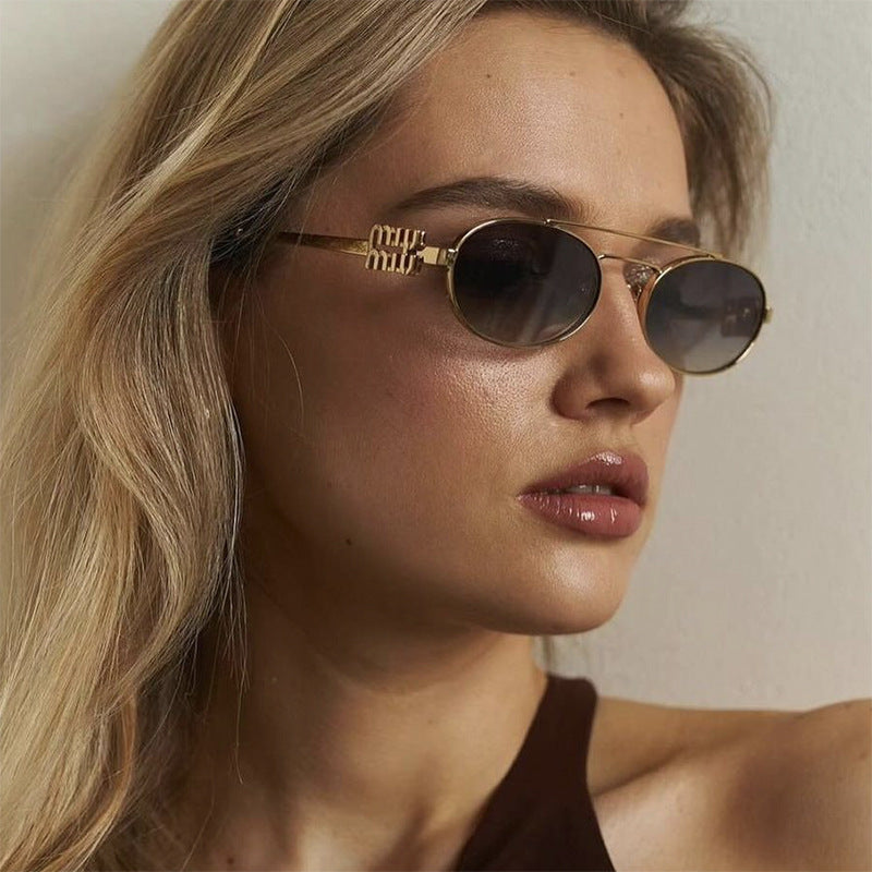 Women's elegant oval sunglasses with luxurious metal frame Karnz