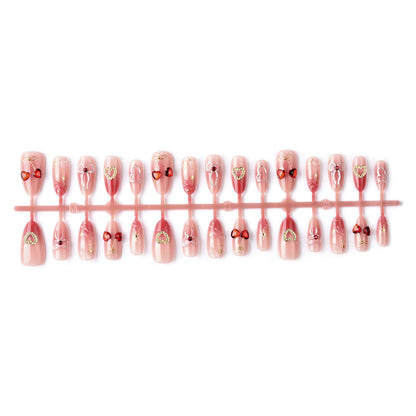 Decorative artificial nails with romantic heart and bow motifs Acalora