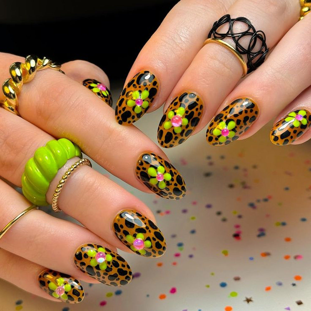 Artificial nails in modern animal patterns with floral accents Acalora