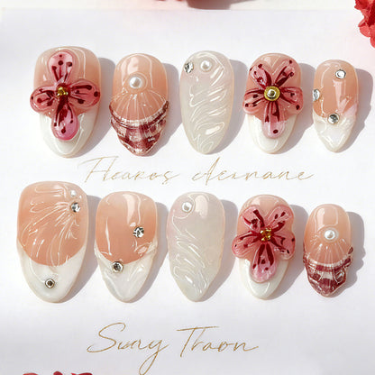 Artificial nails with handcrafted flower and glitter elements Acalora
