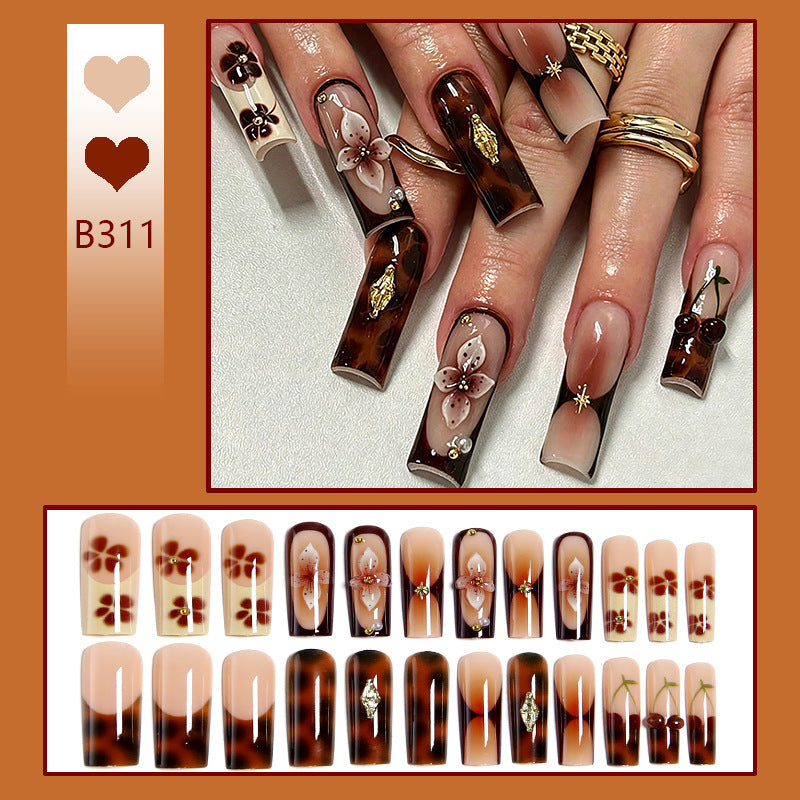 Artificial nails with creative 3D flower design and glitter accents Acalora