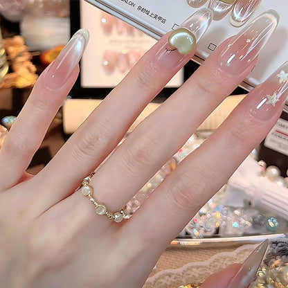 Artificial nail set with sparkling glitter accents Acalora
