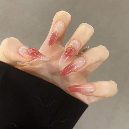 Nail set in elegant ombre design with artistic accents Acalora