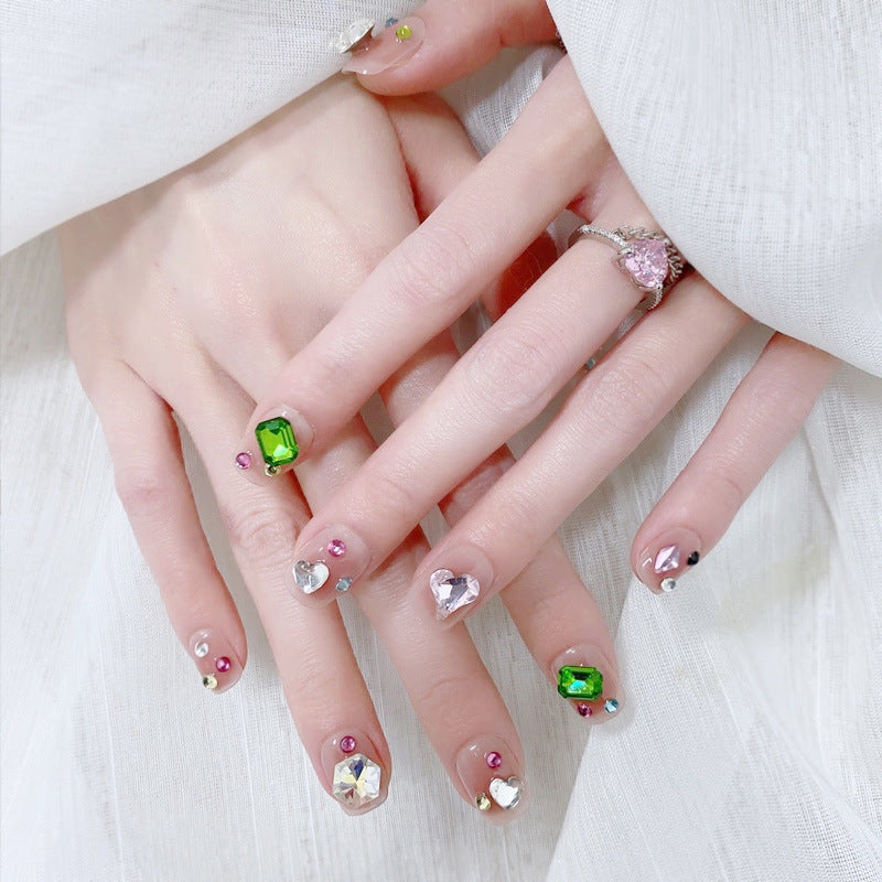 Acrylic nail set with sparkling 3D applications and beautiful heart designs Acalora