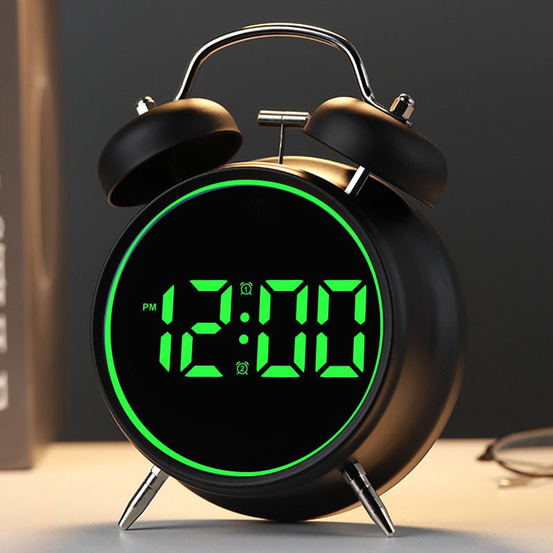Digital alarm clock with alarm and temperature display