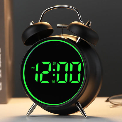 Digital alarm clock with alarm and temperature display