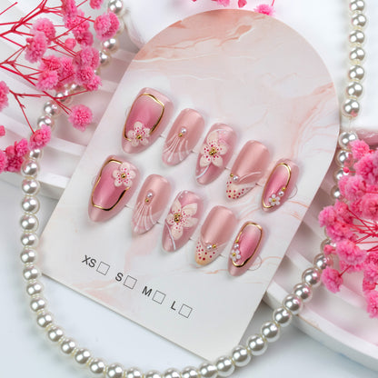 Nail set with floral design and elegant accents Acalora