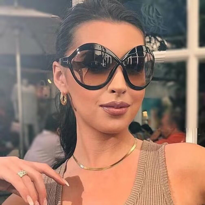 Ladies extravagant shaped sunglasses Bowlift