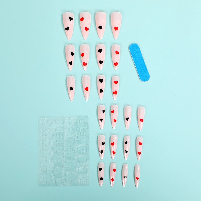 Glamorous artificial nails with heart accents Acalora
