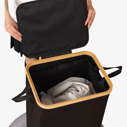 Elegant laundry container with practical lid and carrying system Acalora
