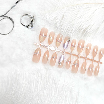 Artificial nails with modern glitter and stone embellishments Acalora