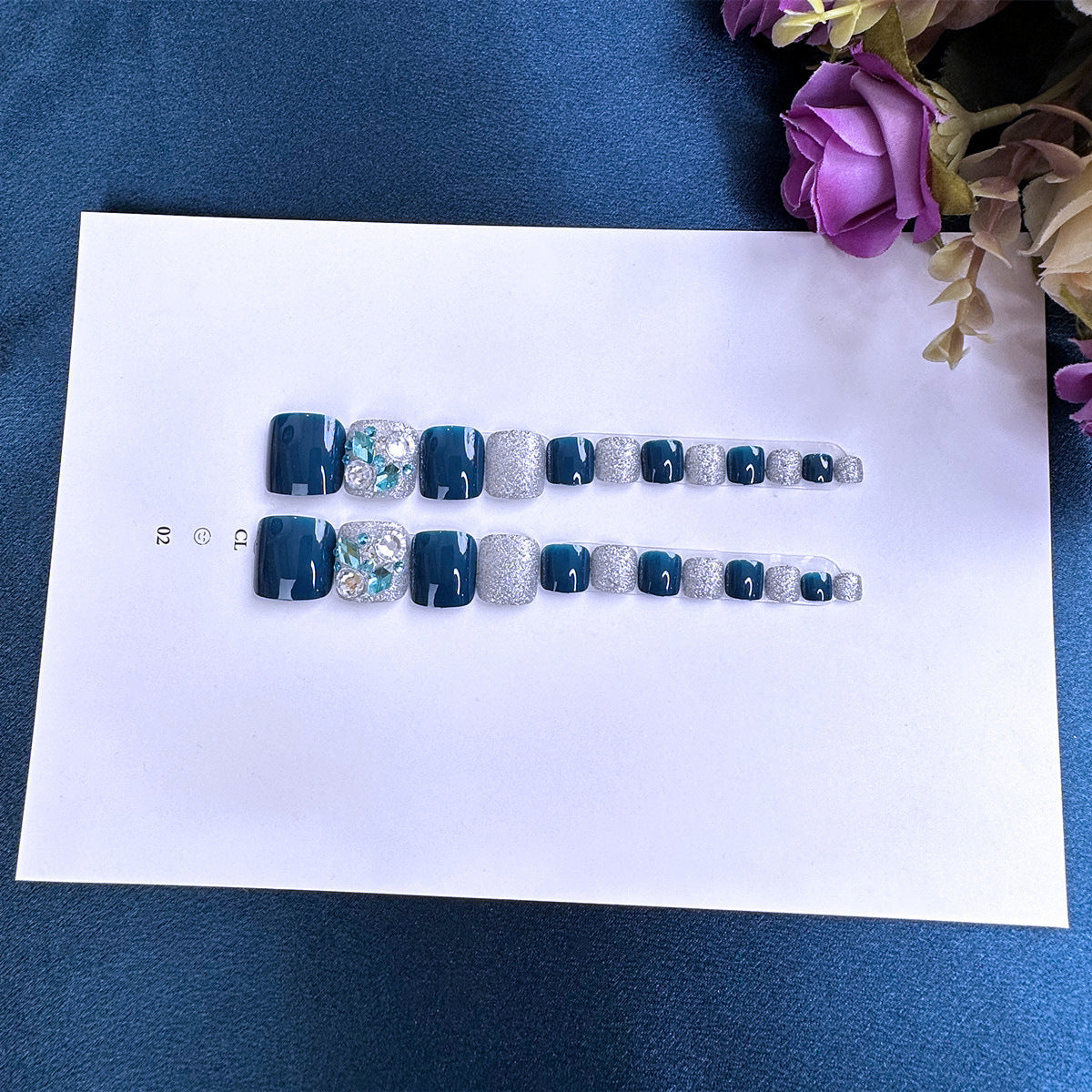 Artful toenail art with glitter and stone appliqués Acalora