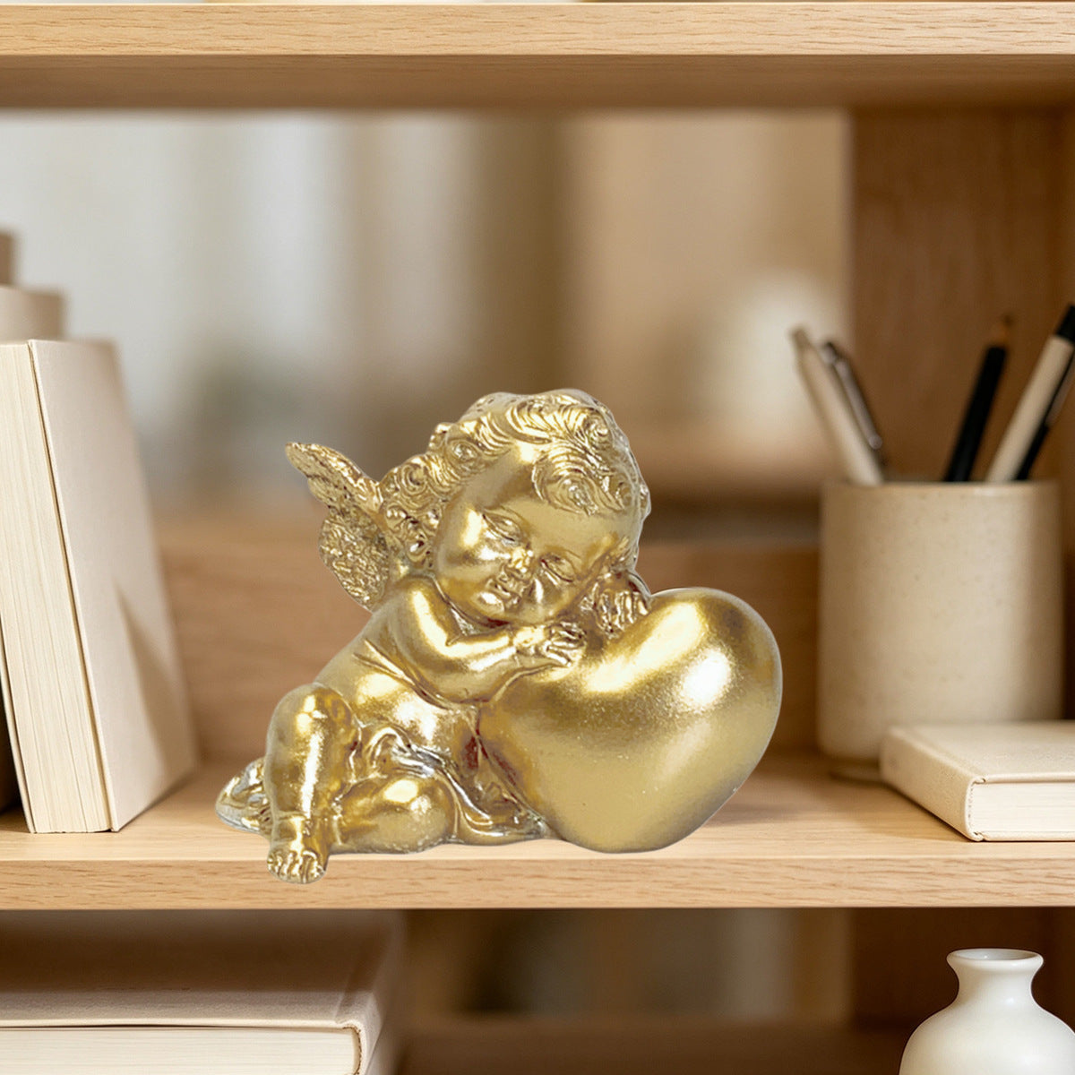 Charming angel figure with heart motif Acalora