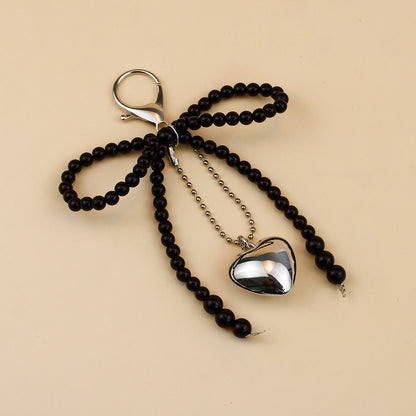 Elegant Pearl Bow Brooch Acalora