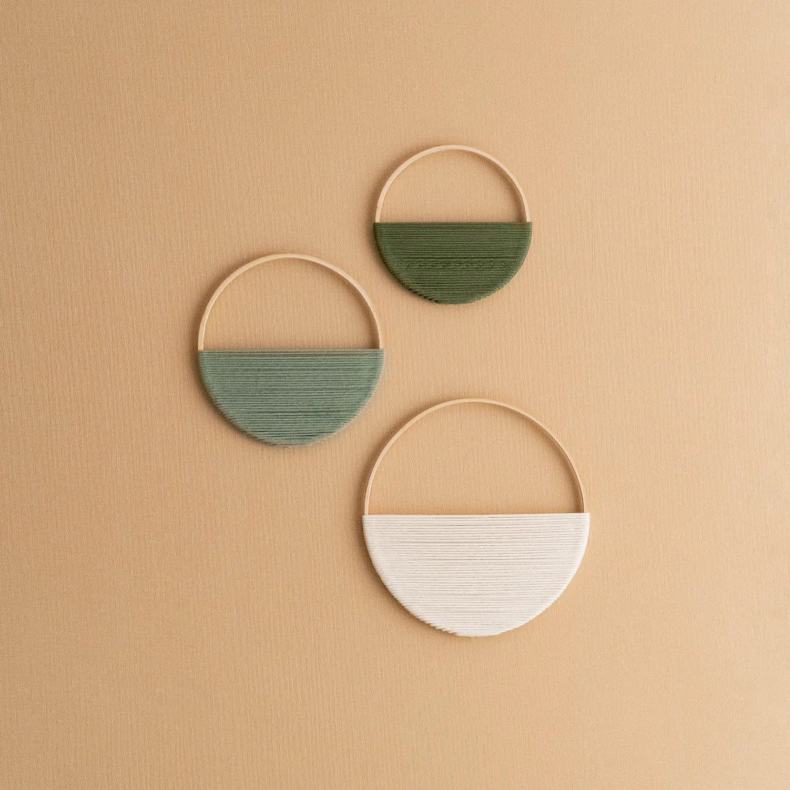 Modern wall art piece made of macrame and wood