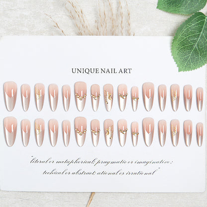 Glamorous art nails with elegant golden details Acalora