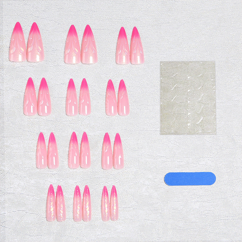 Artificial nails in modern design with pointed accents Acalora
