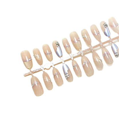 Artificial nails with modern glitter and stone embellishments Acalora