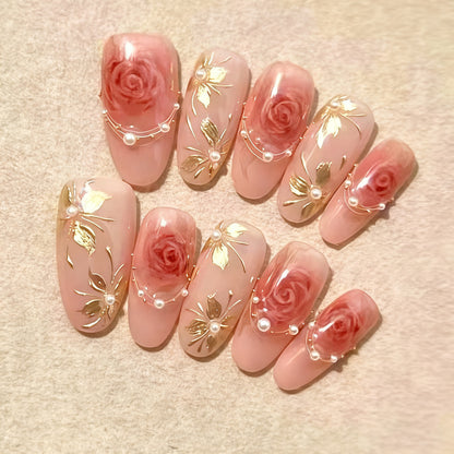 Artificial nail set with glamorous floral designs and creative glitter accents Acalora