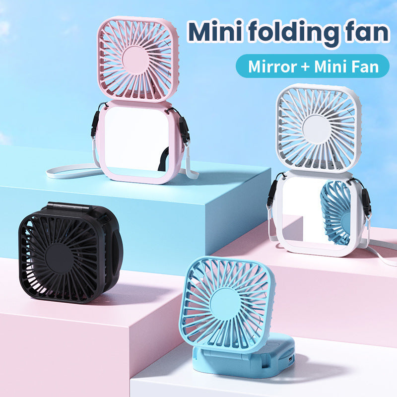 Unisex nan compact foldable clip on handheld desk fan with built in mirror adjustable tilt and USB rechargeable battery Bowlift