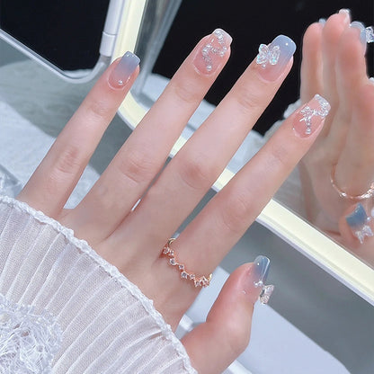 Acrylic nail set with sparkling glitter elements and appealing ombre design Acalora