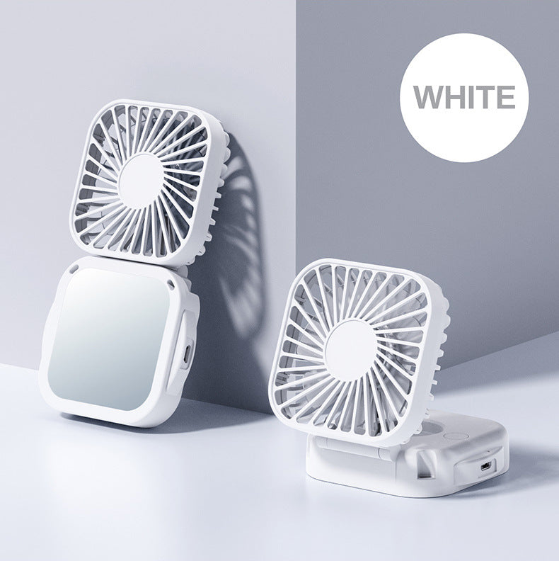Unisex nan compact foldable clip on handheld desk fan with built in mirror adjustable tilt and USB rechargeable battery Bowlift